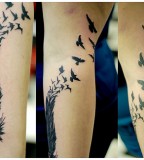 Unique Artistic Feather And Bird Leg Tattoo Design 