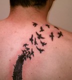 Eagle Feather Morphing Into Ravens Theme Tattoo on Men Back