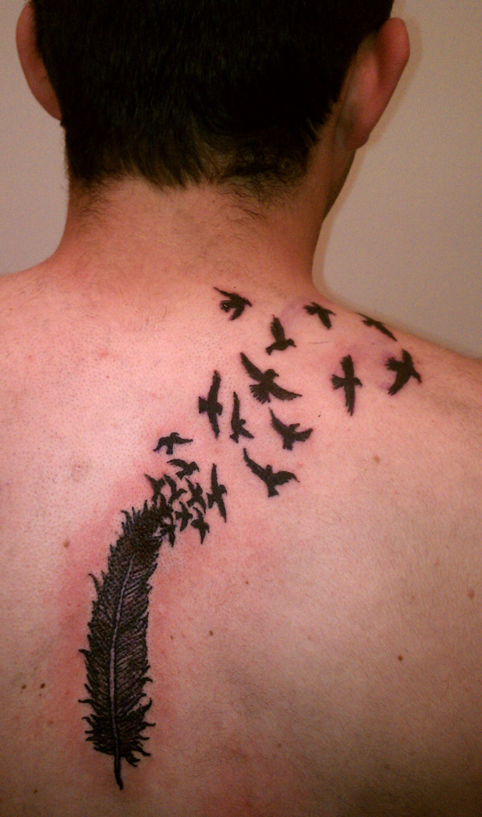 Eagle Feather Morphing Into Ravens Theme Tattoo on Men Back