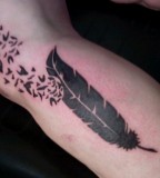 Cool Feather Birds Tattoo on Outer Leg