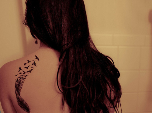 Gorgeous Feather Scatter To Birds Tattoo on Girl's Back Shoulder