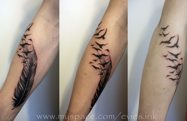 Stunning Circling Birds of A Feather Tattoo on Lower Arm