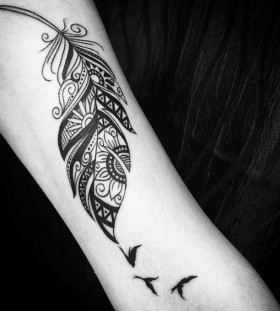 feather tribal tattoo