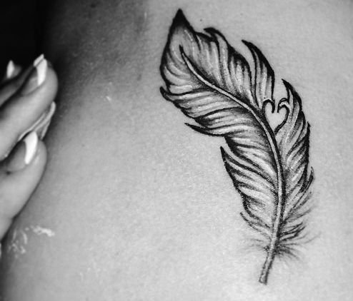 feather with a heart