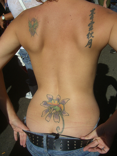 Feminine Lower-back & Shoulder Tattoo Designs for Women (NSFW)