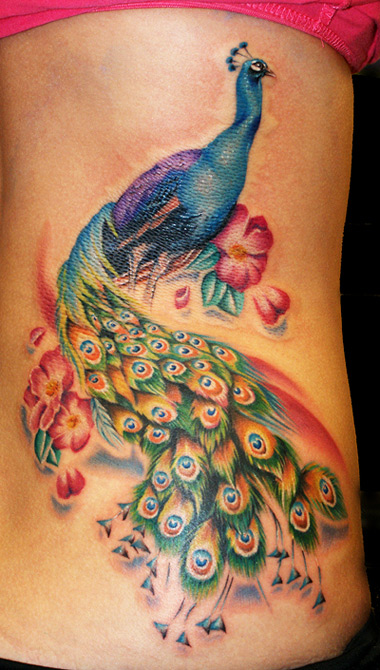 Beautiful Peacock Bird Tattoo Designs on Rib cage for Women – Bird Tattoos