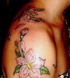Feminine Upper-arm to Over-shoulder Flowers Tattoo Design for Women