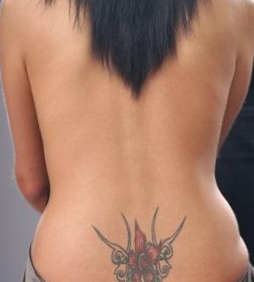 Lower Back Tribal Flower Tattoos for Women - Flower Tattoos