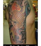 Koi Fish Tattoo Full in the Arm for Man