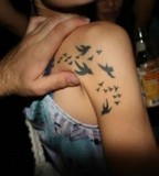 Astounding Bird Silhouette Tattoo Designs 