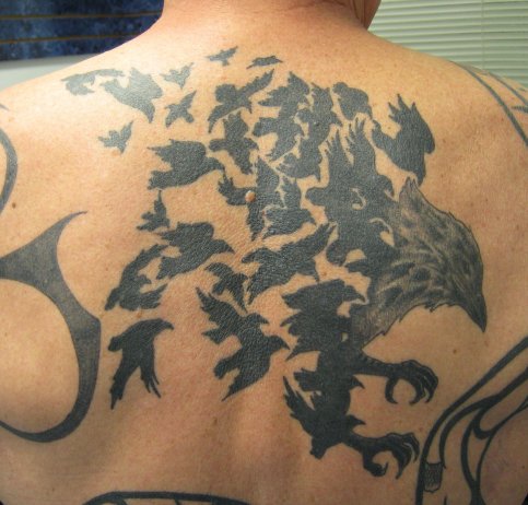 Awesome Flock Of Birds Back Tattoo