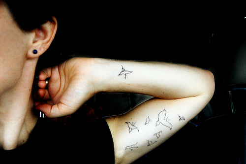 Little Birds Flying Away  Arm Tattoo