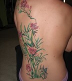Flower Tattoo On Back Side For Girls