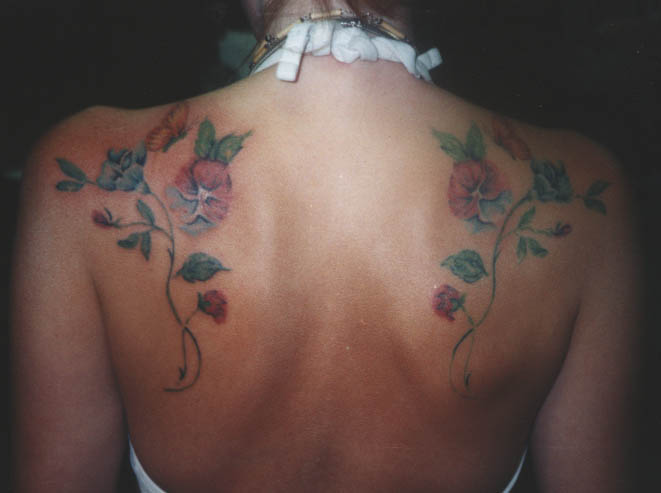 Hawaiian Flower Tattoo On Back for Women