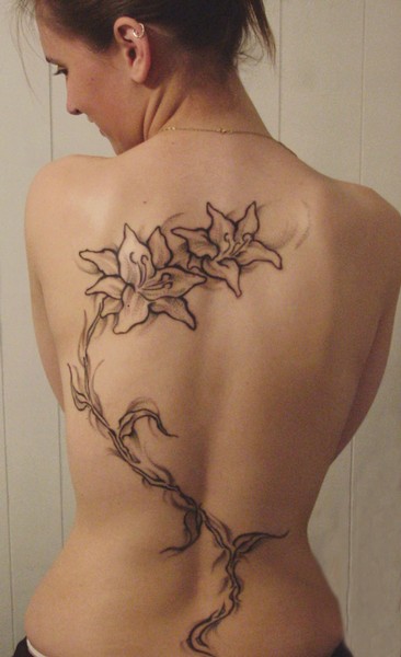 Hawaiian Flower Tattoos On Back for Girl