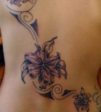 Large Lily Flower Back Piece Tattoo Design