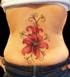 Lower Back Lily Tattoo Designs for Women