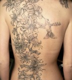 Huge Flower Tattoo Design on Back Neck