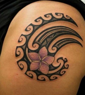 flower thigh tribal tattoo