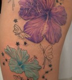 2 Flower Stars Butterflies Tattoo On Thigh