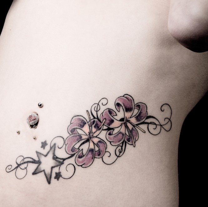 Hip Stars Flowers Tattoo Design