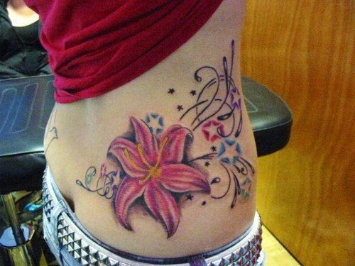 Lotus Flowers And Swirl Tattoo Lower Back