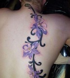 Purple Flower Tribal Tattoo For Women