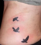 Lovely Flying Bird Silluoette Waist Tattoo Image For Girls
