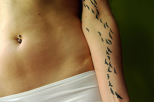 Terrific Photo Of Flying Bird Silhouette Tattoo Inspiration On Arm