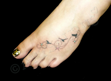 Beautiful Creative Flying Bird Silhouette Tattoo On Foot