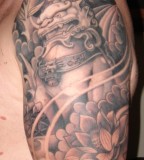 Upper Arm Foo Dog Tattoo Close Up Picture