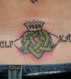 Unique Love Four Leaf Clover Tattoo On Back With Nicknames
