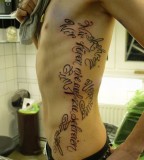 Cool German Tattoo on Side Ribs