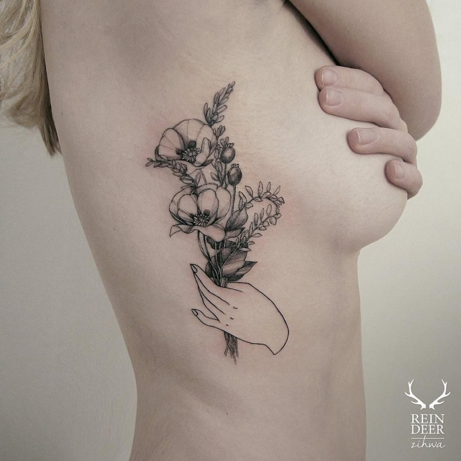 gorgeous-ribcage-flower-tattoo