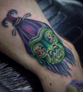 green voodoo tattoo