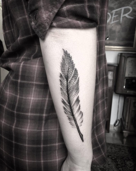 grey feather tattoo