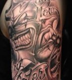 Smiling and Scary Clowns Black White Arm Tattoo 