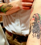 Gypsy Head Tattoo on Left Elbow with Great Details