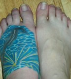 Colored Imaginative Hammerhead Shark Tattoo On Left Foot