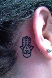 Small Hamsa Tattoo Close to Right Ear