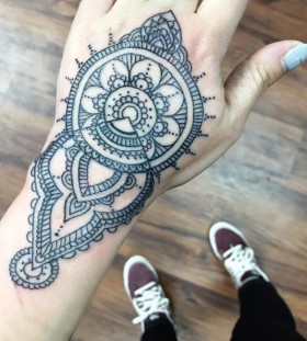 hand mandala tattoo