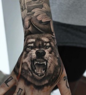 hand-wolf-tattoos