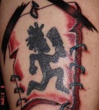 On Arm Hatchet Man Tattoo