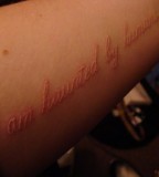 Quotes White Ink Tattoo on Forearm