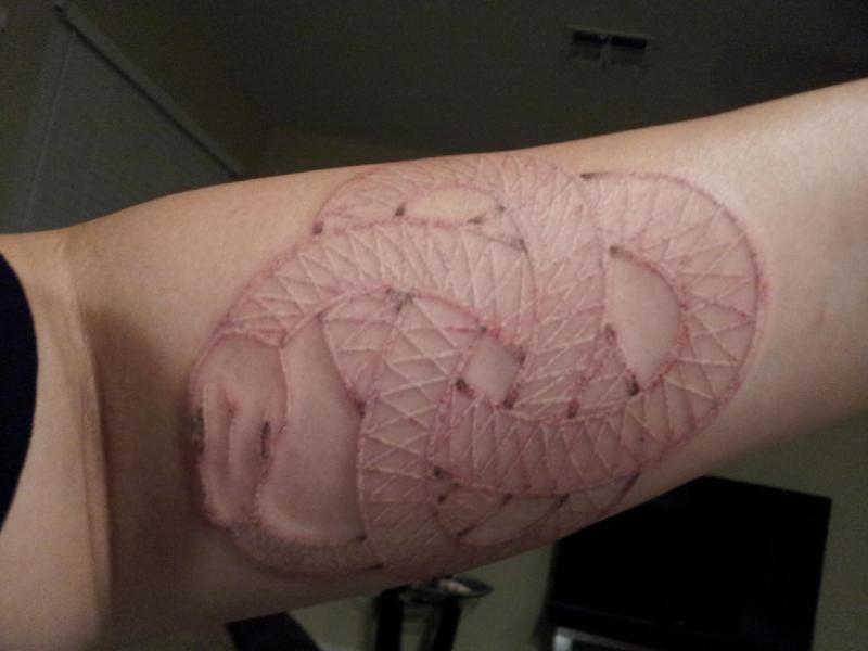Snake White Ink Tattoo on Forearm