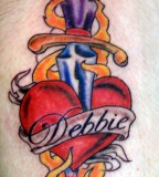 Red Yellow Blue Heart And Dagger Tattoo Image