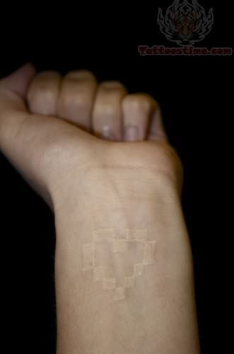 White Ink Heart Tattoos On Wrist