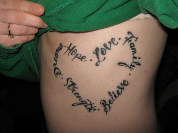 Enticing Word Tattoos On Side Body Ideas