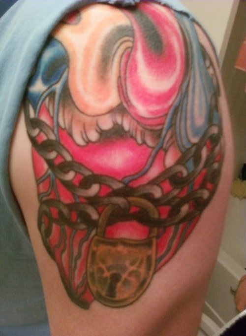 Awesome Heart With Chain And Lock Tattoo Picture