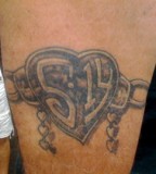 Awesome Heartlocket Chain Tattoo Design Idea